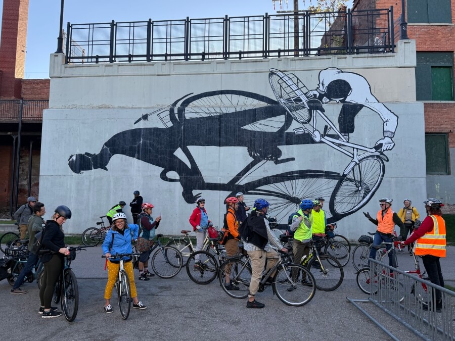 Group of urban cyclists taking a break in the Dequindre Cut in Detroit, MI — October 2025